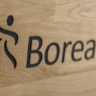 Borealis Massaažitool Lounge puitpaneelide moderne disain ja naturaalne toon suures plaanis